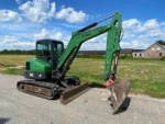 Miniexcavadora BOBCAT E55 usada de 5,7 T (2012), con mantenimiento y 3 cucharones.