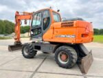 Pala sobre neumáticos Doosan DX140W 2010 – 14.8T – 7857h – Usada - Imagen 2